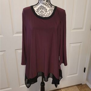 Woman's purple and black tunic top